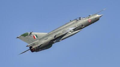 A MIG-21 aircraft flies past during the inauguration of the 12th edition of AERO India 2019 air show at Yelahanka airbase in Bengaluru, 2019 (AP) A MIG-21 aircraft flies past during the inauguration of the 12th edition of AERO India 2019 air show at Yelahanka airbase in Bengaluru, 2019 (AP)