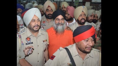 A file photo of ex-militant Gurdeep Singh Khera being brought to Amritsar. (HT File Photo) A file photo of ex-militant Gurdeep Singh Khera being brought to Amritsar. (HT File Photo)