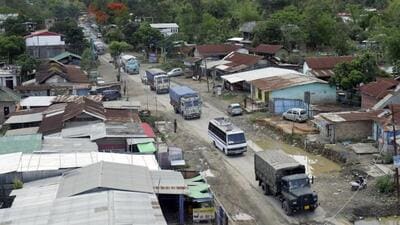 Manipur violence: A convoy of vehicles including carrying essential goods moved under the escort of CRPF and Manipur Police from Noney to Imphal in view of the ongoing tensions in Manipur (ANI File) Manipur violence: A convoy of vehicles including carrying essential goods moved under the escort of CRPF and Manipur Police from Noney to Imphal in view of the ongoing tensions in Manipur (ANI File)