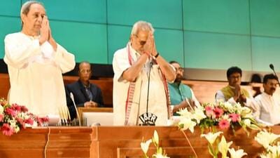 Odisha governor Ganeshi Lal and chief minister Naveen Patnaik at the oath event for the three BJD legislators inducted as ministers (Twitter/GovernorOdisha) Odisha governor Ganeshi Lal and chief minister Naveen Patnaik at the oath event for the three BJD legislators inducted as ministers (Twitter/GovernorOdisha)