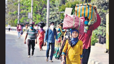 Over 1.1 million migrants, including over half a million workers, travelled back to their home states, such as Uttar Pradesh, Bihar, Chhattisgarh and Jharkhand during the first wave of the pandemic and subsequent lockdown. The state and central government had arranged 799 shramik trains in May 2020, to transport them to control the spread of the virus. (HT PHOTO)