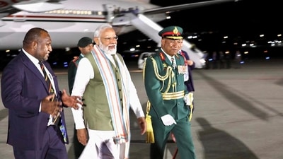 India's Prime Minister Narendra Modi is greeted by Papua New Guinea's Prime Minister James Marape  at Jackson International Airport, at Papua New Guinea. (Reuters)