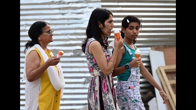 Residents enjoying ice cream on a hot summer day at Plaza Sector 17 in Chandigarh on Monday. (Keshav Singh/HT) Residents enjoying ice cream on a hot summer day at Plaza Sector 17 in Chandigarh on Monday. (Keshav Singh/HT)