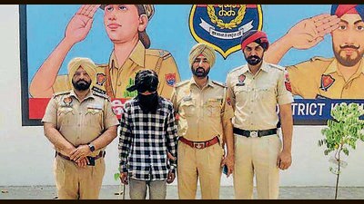 The accused in police custody in Ludhiana on Monday. (HT Photo) The accused in police custody in Ludhiana on Monday. (HT Photo)
