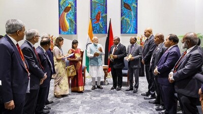 Prime Minister Modi launches a translation of the Tamil classic "Thirukkural" in the Tok Pisin language of Papua New Guinea. The country's prime minister James Marape is also seen in the picture along with other officials. (PTI) Prime Minister Modi launches a translation of the Tamil classic "Thirukkural" in the Tok Pisin language of Papua New Guinea. The country's prime minister James Marape is also seen in the picture along with other officials. (PTI)
