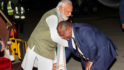 As Prime Minister Narendra Modi arrived in Papua New Guinea (PNG) on Sunday, PNG Prime Minister James Marape touched his feet and sought his blessings. This is PM Modi's first tour to PNG, as well as the first-ever visit by any Indian Prime Minister to the Indo-Pacific country. (ANI) As Prime Minister Narendra Modi arrived in Papua New Guinea (PNG) on Sunday, PNG Prime Minister James Marape touched his feet and sought his blessings. This is PM Modi's first tour to PNG, as well as the first-ever visit by any Indian Prime Minister to the Indo-Pacific country. (ANI)