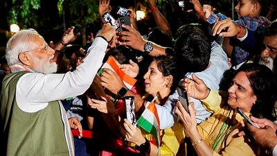 The Indian diaspora in Papua New Guinea (PNG) were immersed in a festival-like celebration upon Prime Minister Narendra Modi's arrival at PNG's capital city Port Moresby on Friday. The members of the Indian community in PNG said that they were delighted with the visit of PM Modi to PNG. A group of three little girls said in a cheerful way, "We love you Modiji. Welcome to Papua New Guinea." (PTI) The Indian diaspora in Papua New Guinea (PNG) were immersed in a festival-like celebration upon Prime Minister Narendra Modi's arrival at PNG's capital city Port Moresby on Friday. The members of the Indian community in PNG said that they were delighted with the visit of PM Modi to PNG. A group of three little girls said in a cheerful way, "We love you Modiji. Welcome to Papua New Guinea." (PTI)