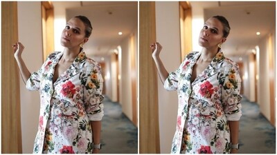 In golden ear studs from the shelves of Niiaashi and nude stilettos, Neha further accessorised her look for the day. (Instagram/@nehadhupia) In golden ear studs from the shelves of Niiaashi and nude stilettos, Neha further accessorised her look for the day. (Instagram/@nehadhupia)