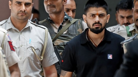 Gangster Lawrence Bishnoi leaves after appearing before the Patiala House Court, in New Delhi. (File) (ANI)