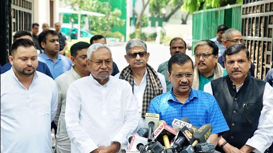 Delhi chief minister Arvind Kejriwal with his Bihar counterpart Nitish Kumar on Sunday. (ANI)