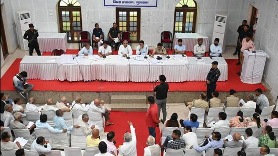 Gurugram, India-May 22, 2023: Jai Parkash Dalal, Agriculture minister, Nishant Kumar Yadav, Deputy Commissioner and Satya Prakash Jaravata, MLA hearing a complaint during the grievance committee meeting in John Hall at Civil line, in Gurugram, India, on Monday, 22 May 2023. (Photo by Parveen Kumar/Hindustan Times)(Pic to go with Abhishek's story)