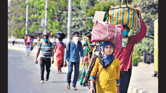Over 1.1 million migrants, including over half a million workers, travelled back to their home states, such as Uttar Pradesh, Bihar, Chhattisgarh and Jharkhand during the first wave of the pandemic and subsequent lockdown. The state and central government had arranged 799 shramik trains in May 2020, to transport them to control the spread of the virus. (HT PHOTO)
