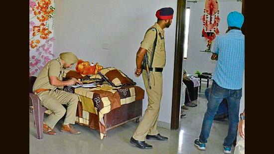 Police at the ex cop’s house in in Ludhiana on Monday. (Mainsh/HT)