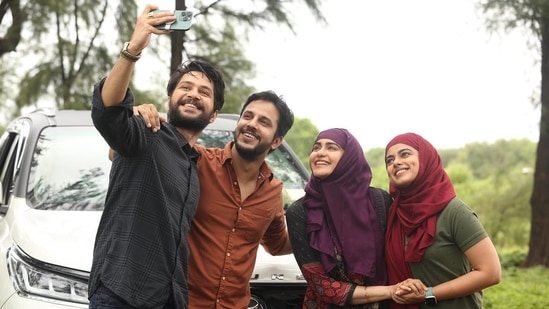 Adah Sharma and the cast members in a scene from The Kerala Story.