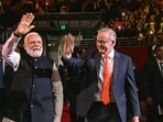 Prime Minister Narendra Modi with his Australian counterpart Anthony Albanese arrives to attend an Indian community programme, in Sydney, Tuesday, May 23, 2023.