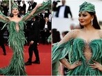 Cannes 2023: Urvashi Rautela walks the red carpet in a green feather gown. Cannes 2023: Urvashi Rautela walks the red carpet in a green feather gown.