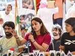 Wrestlers Vinesh Phogat (C), Sakshi Malik and Bajrang Punia during a press conference amid wrestlers protest, at Jantar Mantar in New Delhi. Wrestlers Vinesh Phogat (C), Sakshi Malik and Bajrang Punia during a press conference amid wrestlers protest, at Jantar Mantar in New Delhi.