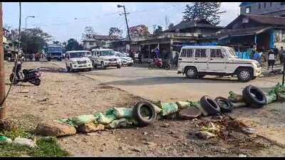 A road wears a partially deserted look in Kangkopki district of Manipur on Tuesday. (PTI) A road wears a partially deserted look in Kangkopki district of Manipur on Tuesday. (PTI)