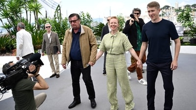 Finnish director Aki Kaurismaki and Finnish actors Alma Poysti and Jussi Vatanen posed during a photocall for the film Kuolleet Lehdet (Fallen Leaves) during the Cannes Film Festival. Alma wore a green co-ord outfit while Aki and Jussi were dressed in casuals. (AFP) Finnish director Aki Kaurismaki and Finnish actors Alma Poysti and Jussi Vatanen posed during a photocall for the film Kuolleet Lehdet (Fallen Leaves) during the Cannes Film Festival. Alma wore a green co-ord outfit while Aki and Jussi were dressed in casuals. (AFP)