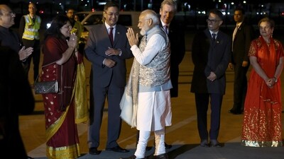 PM Modi was received by Australian High Commissioner to India Barry O'Farrell and other officials upon his arrival in Sydney. (AP) PM Modi was received by Australian High Commissioner to India Barry O'Farrell and other officials upon his arrival in Sydney. (AP)