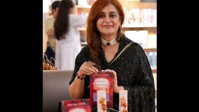 Chetna Keer with her latest book, Garnets Under My Gulmohar (HT Photo)
