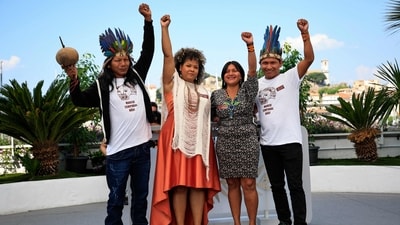 Francisco Hyjno Kraho, Debora Sodre, Luzia Cruwakwyj Kraho and Henrique Ihjac Kraho poses during a photocall for the film Crowra (The Buriti Flower) at the 76th edition of the Cannes Film Festival. (AFP) Francisco Hyjno Kraho, Debora Sodre, Luzia Cruwakwyj Kraho and Henrique Ihjac Kraho poses during a photocall for the film Crowra (The Buriti Flower) at the 76th edition of the Cannes Film Festival. (AFP)