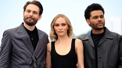 Sam Levinson, Lily-Rose Depp and Abel Tesfaye aka The Weeknd at the photocall for The Idol at the Cannes Film Festival on May 23, 2023. (Photo by Valery HACHE / AFP) (AFP) Sam Levinson, Lily-Rose Depp and Abel Tesfaye aka The Weeknd at the photocall for The Idol at the Cannes Film Festival on May 23, 2023. (Photo by Valery HACHE / AFP) (AFP)