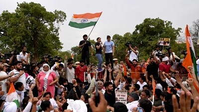 The candlelight march was organised to mark a month of the sit-in protest, in which nearly 1,000 protestors demanded the resignation and arrest of Wrestling Federation of India (WFI) president Brij Bhushan Sharan Singh. (AFP)