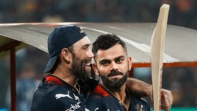Virat Kohli and Glenn Maxwell before the start of the IPL 2023 cricket match between Royal Challengers Bangalore and Gujarat Titans, at M Chinnaswamy Stadium in Bengaluru (PTI) Virat Kohli and Glenn Maxwell before the start of the IPL 2023 cricket match between Royal Challengers Bangalore and Gujarat Titans, at M Chinnaswamy Stadium in Bengaluru (PTI)