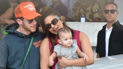 Priyanka Chopra, Nick Jonas with daughter Malti Marie Chopra Jonas at Mumbai airport. Priyanka Chopra, Nick Jonas with daughter Malti Marie Chopra Jonas at Mumbai airport.