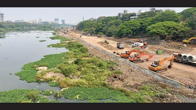 Walking track work underway at riverside near Band Garden in Yerawada. (HT PHOTO) Walking track work underway at riverside near Band Garden in Yerawada. (HT PHOTO)