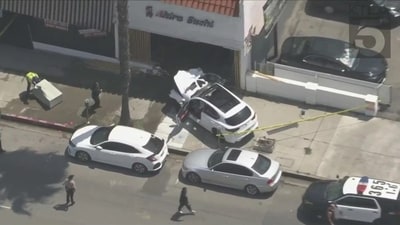 Footage shows the wreckage outside the Sushi Restaurant. (Image Credit: KTLA)