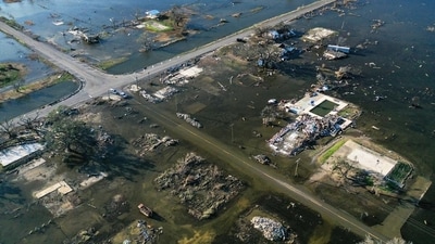 An aerial view of flood waters and destruction caused by Hurricane Delta in Creole, Louisiana in 2020. (Mario Tama / AFP) An aerial view of flood waters and destruction caused by Hurricane Delta in Creole, Louisiana in 2020. (Mario Tama / AFP)