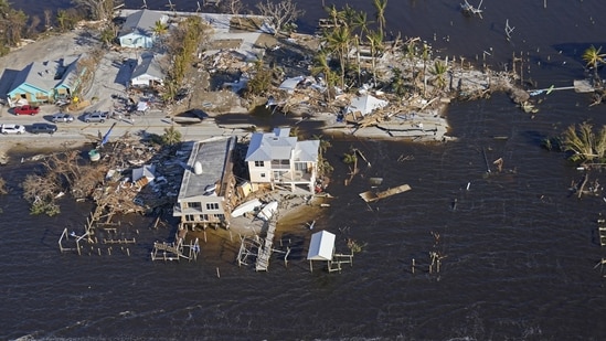 The bridge leading from Fort Myers to Pine Island, Fla., is seen heavily damaged in the aftermath of Hurricane Ian on Pine Island, Fla., Oct. 1, 2022. (AP Photo/Gerald Herbert, File)