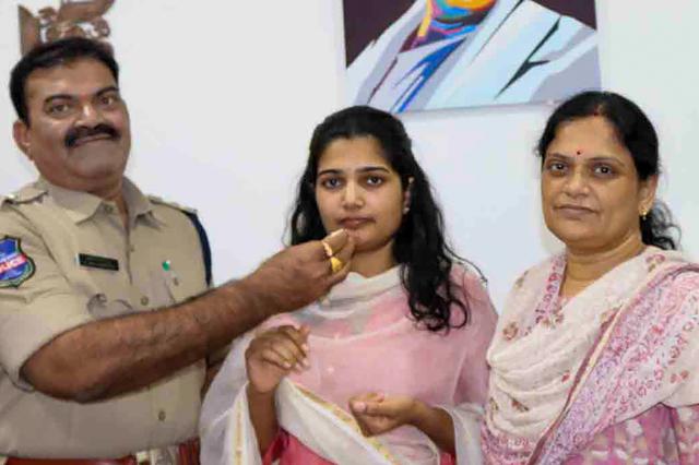 N Uma Harathi from Telangana, who secured the third rank, with her family. (PTI) N Uma Harathi from Telangana, who secured the third rank, with her family. (PTI)