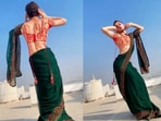 Man dancing in a saree to Sharara. Man dancing in a saree to Sharara.