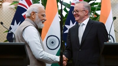 Prime Minister Narendra Modi shakes hands with Australian Prime Minister Anthony Albanese following a joint press conference at Admiralty House in Sydney. (AP) Prime Minister Narendra Modi shakes hands with Australian Prime Minister Anthony Albanese following a joint press conference at Admiralty House in Sydney. (AP)
