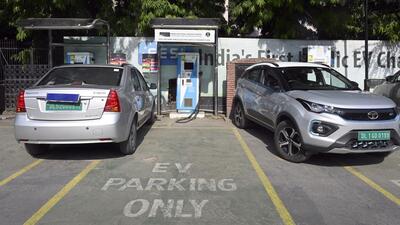 An electric vehicle charging station on Rafi Marg in New Delhi. A senior NDMC official said that the first phase of installing EV charging stations prioritised government buildings and offices, while the second phase will focus on public spaces and parking sites managed by the civic body. (Sanjeev Verma/HT Photo)