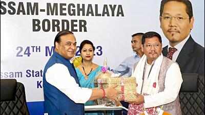 Assam chief minister Himanta Biswa Sarma and his Meghalaya counterpart Conrad Sangma met in Guwahati on Wednesday. (PTI) Assam chief minister Himanta Biswa Sarma and his Meghalaya counterpart Conrad Sangma met in Guwahati on Wednesday. (PTI)