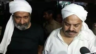 Atiq and Ashraf minutes before being shot dead (HT Photo) Atiq and Ashraf minutes before being shot dead (HT Photo)