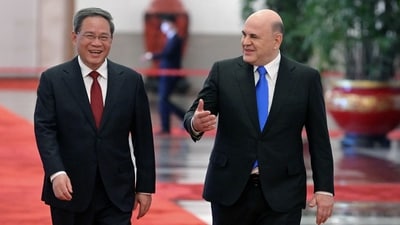 Russian Prime Minister Mikhail Mishustin and Chinese Premier Li Qiang. (via REUTERS)