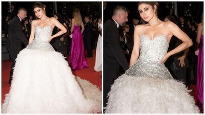 The gorgeous and talented Mouni Roy made her Cannes International Film Festival debut this year along with several other Bollywood celebs. She recently walked the red carpet like a princess in disguise in a white sparkling feathered gown. (Instagram/@imouniroy) The gorgeous and talented Mouni Roy made her Cannes International Film Festival debut this year along with several other Bollywood celebs. She recently walked the red carpet like a princess in disguise in a white sparkling feathered gown. (Instagram/@imouniroy)