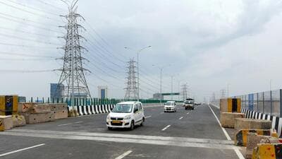 Commuters near the NH-48 cloverleaf flyover on the Central Peripheral Road in Gurugram which was opened for commuters on Wednesday. (Parveen Kumar/HT) Commuters near the NH-48 cloverleaf flyover on the Central Peripheral Road in Gurugram which was opened for commuters on Wednesday. (Parveen Kumar/HT)