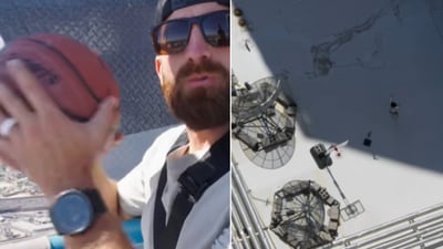 The image shows Dude Perfect dropping a basketball from a height of 856 feet. (YouTuber/@dudeperfect) The image shows Dude Perfect dropping a basketball from a height of 856 feet. (YouTuber/@dudeperfect)