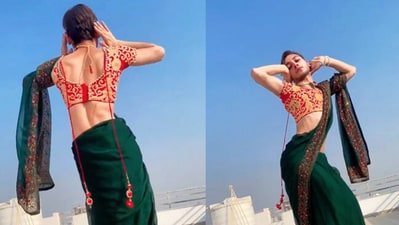 Man dancing in a saree to Sharara. (Instagram/@Amit Sharma)