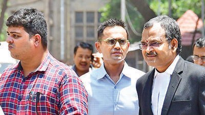 Mumbai, India - May 22, 2023: Former Zonal Director of Mumbai Narcotics Control Bureau Sameer Wankhede being escorted outside the Bombay High Court after the court extended his interim protection against coercive action in the bribery case in connection with the Cordelia Cruise drug bust till June 8, in Mumbai, India, on Monday, May 22, 2023. (Photo by Bhushan Koyande/HT Photo) (HT PHOTO) Mumbai, India - May 22, 2023: Former Zonal Director of Mumbai Narcotics Control Bureau Sameer Wankhede being escorted outside the Bombay High Court after the court extended his interim protection against coercive action in the bribery case in connection with the Cordelia Cruise drug bust till June 8, in Mumbai, India, on Monday, May 22, 2023. (Photo by Bhushan Koyande/HT Photo) (HT PHOTO)