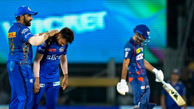 Mumbai Indians bowler Akash Madhwal celebrates with teammate Rohit Sharma (PTI)