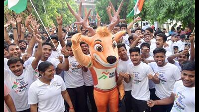 Volunteers participate in the race to promote Khelo India University Games (KIUG) 2023, at KD Singh Babu Stadium, in Lucknow, on Sunday. (ANI Photo) Volunteers participate in the race to promote Khelo India University Games (KIUG) 2023, at KD Singh Babu Stadium, in Lucknow, on Sunday. (ANI Photo)
