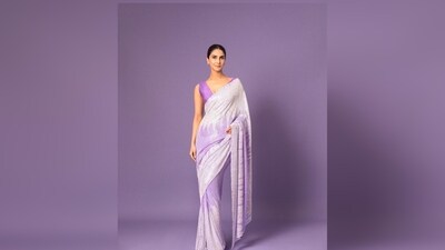 Vaani Kapoor keeps it minimal yet very glamorous in this lavender sequin saree. She paired her look with a sleeveless blouse featuring a plunging neckline. (Instagram/@manishmalhotra05) Vaani Kapoor keeps it minimal yet very glamorous in this lavender sequin saree. She paired her look with a sleeveless blouse featuring a plunging neckline. (Instagram/@manishmalhotra05)