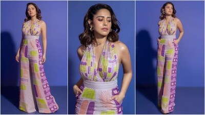 Nushrratt Bharuccha is the epitome of fashion and flair. Not only does this talented actress captivate audiences with her stellar performances, but she also mesmerises fashion enthusiasts with her impeccable style. Her Instagram diaries are a treasure trove for all things fashion, featuring stunning traditional sarees, chic dresses, and now, a jaw-droppingly quirky jumpsuit that showcases her trendsetting persona. Prepare to be spellbound by her fashion escapades! (Instagram/@nushrrattbharuccha) Nushrratt Bharuccha is the epitome of fashion and flair. Not only does this talented actress captivate audiences with her stellar performances, but she also mesmerises fashion enthusiasts with her impeccable style. Her Instagram diaries are a treasure trove for all things fashion, featuring stunning traditional sarees, chic dresses, and now, a jaw-droppingly quirky jumpsuit that showcases her trendsetting persona. Prepare to be spellbound by her fashion escapades! (Instagram/@nushrrattbharuccha)